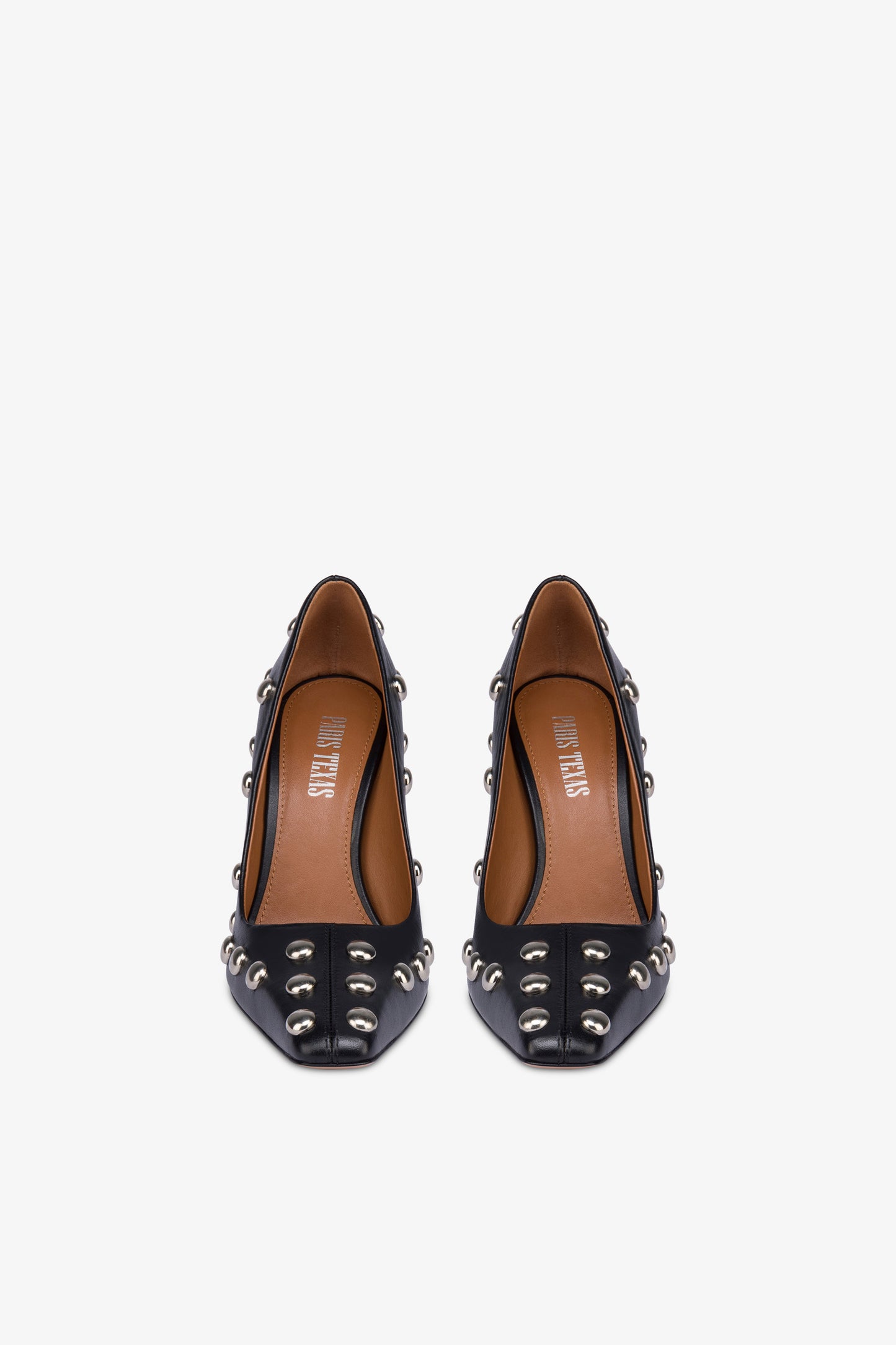 Pumps in nickel-studded black leather