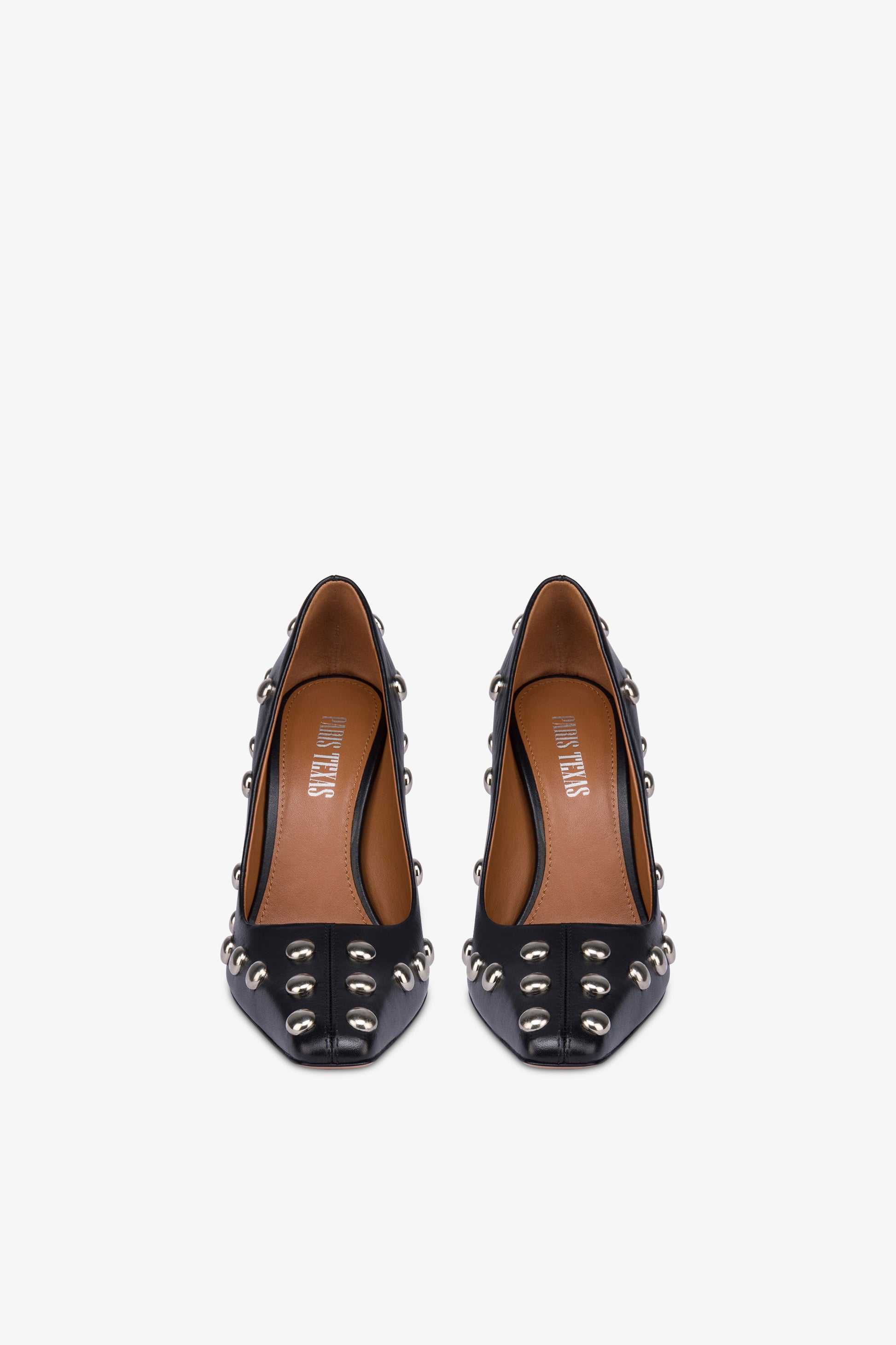 Pumps in nickel-studded black leather