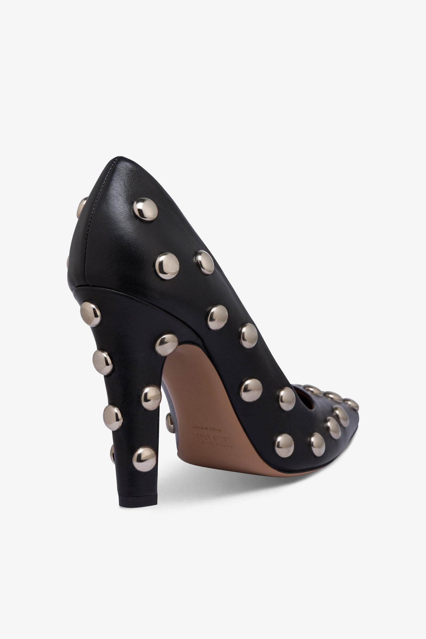 Pumps in nickel-studded black leather