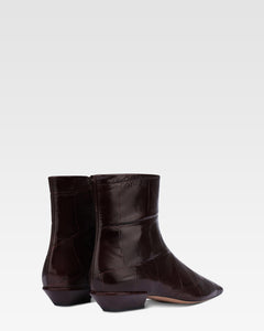 Ankle boots in rouge noir croco-embossed leather