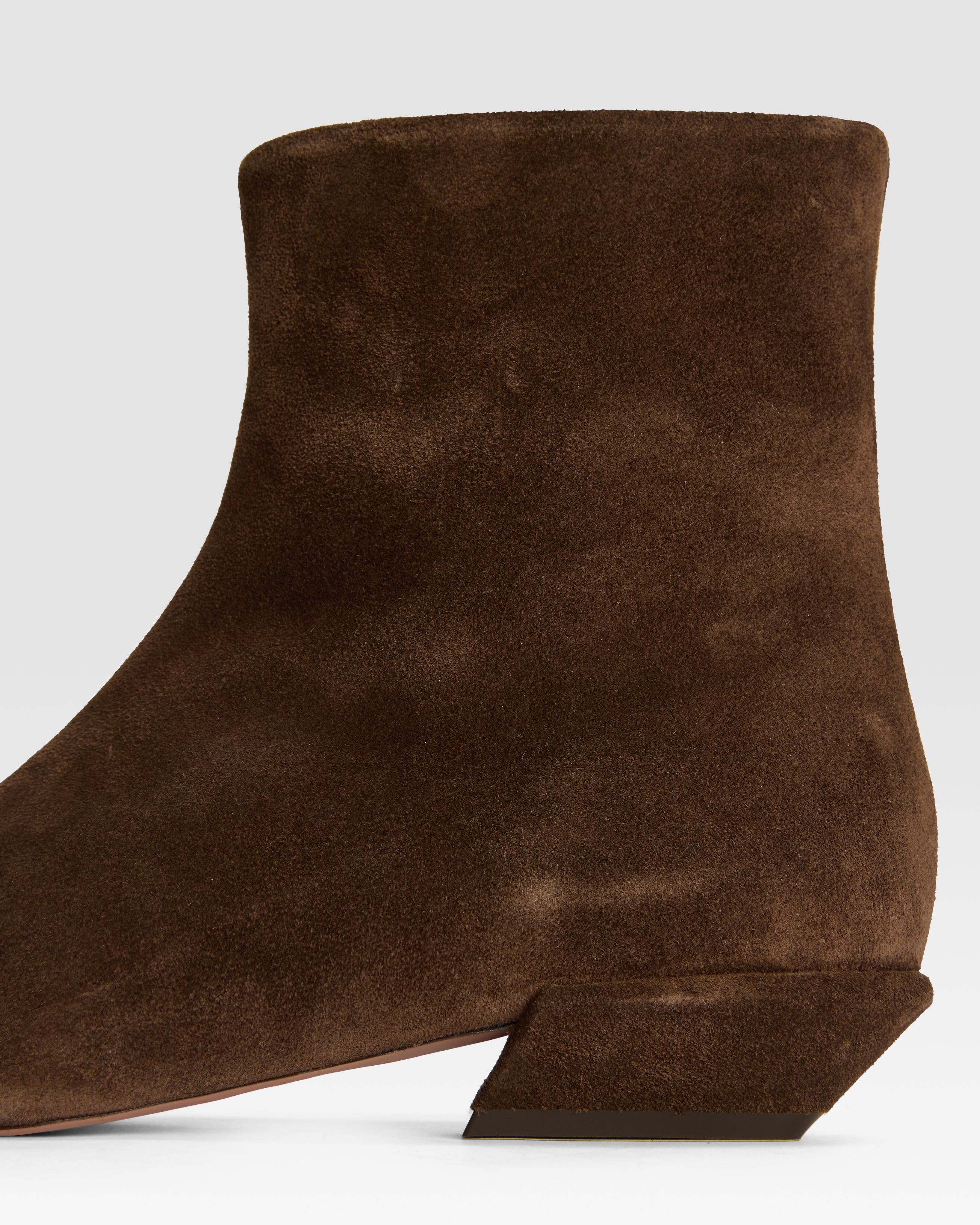 Ankle boots in ebony calf suede leather