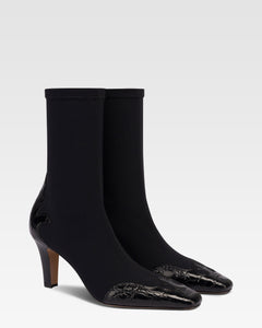 Boots in black croco-embossed and stretchy leather