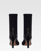 Boots in black croco-embossed and stretchy leather