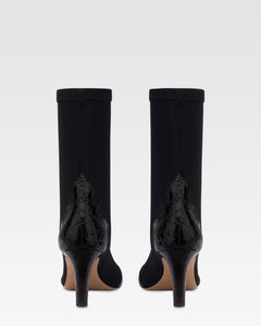 Boots in black croco-embossed and stretchy leather