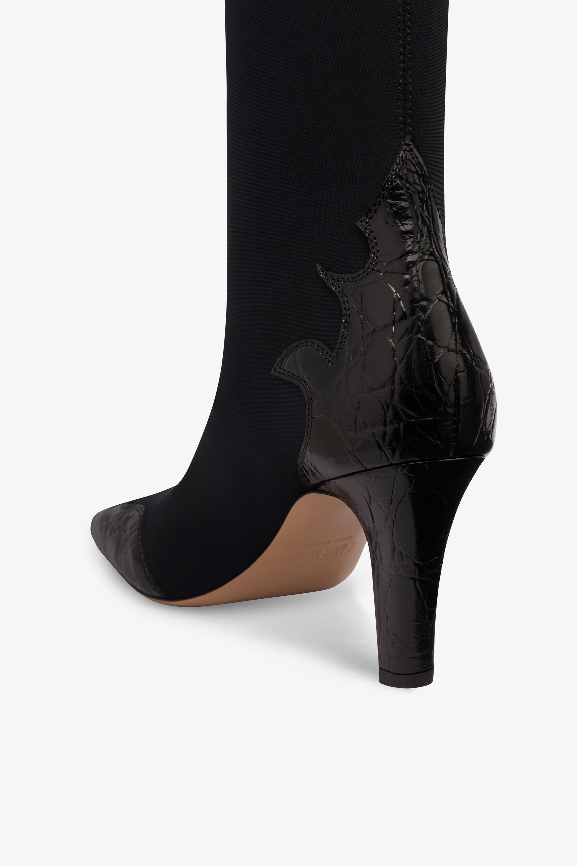 Boots in black croco-embossed and stretchy leather