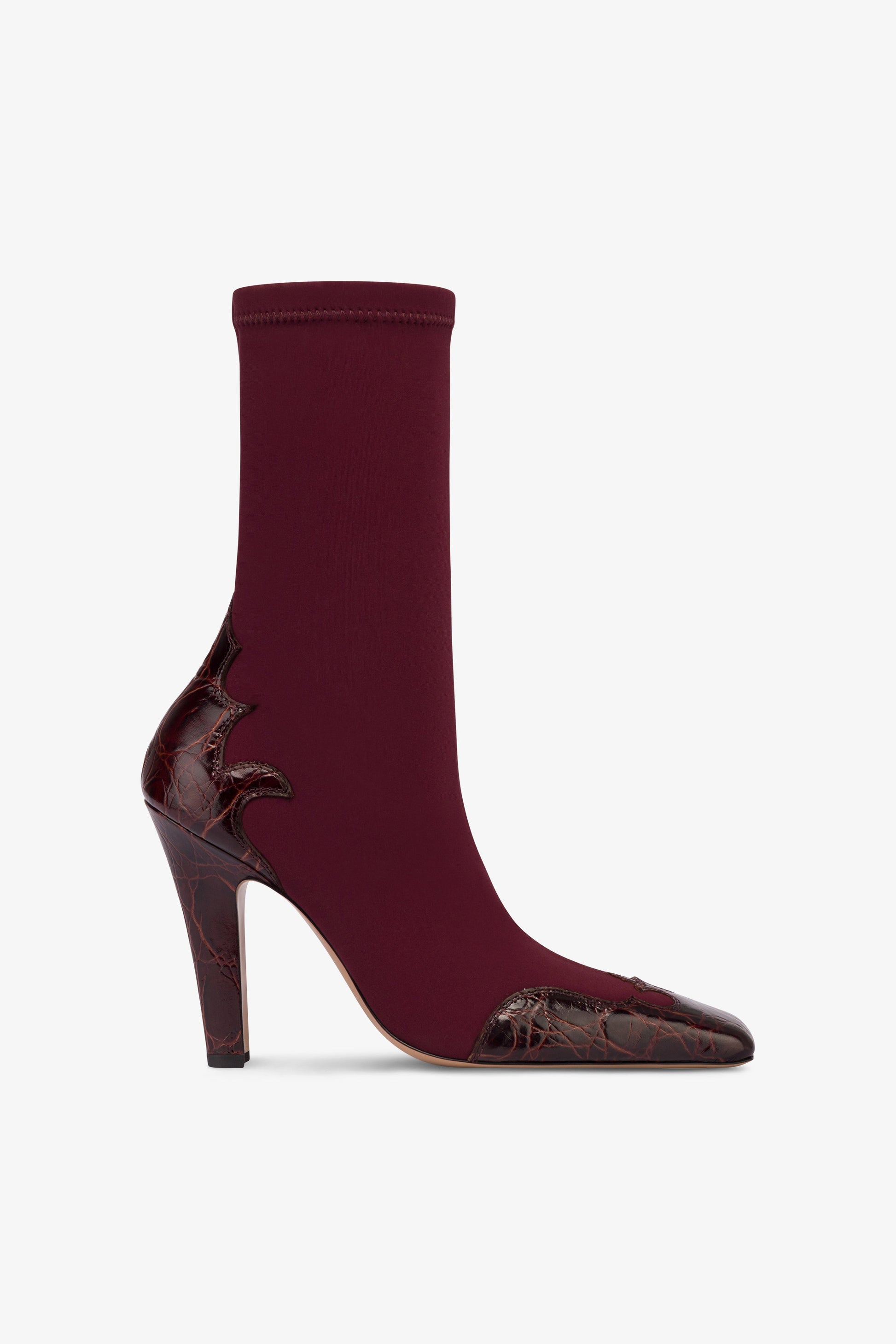 Boots in burgundy croco-embossed and stretchy leather