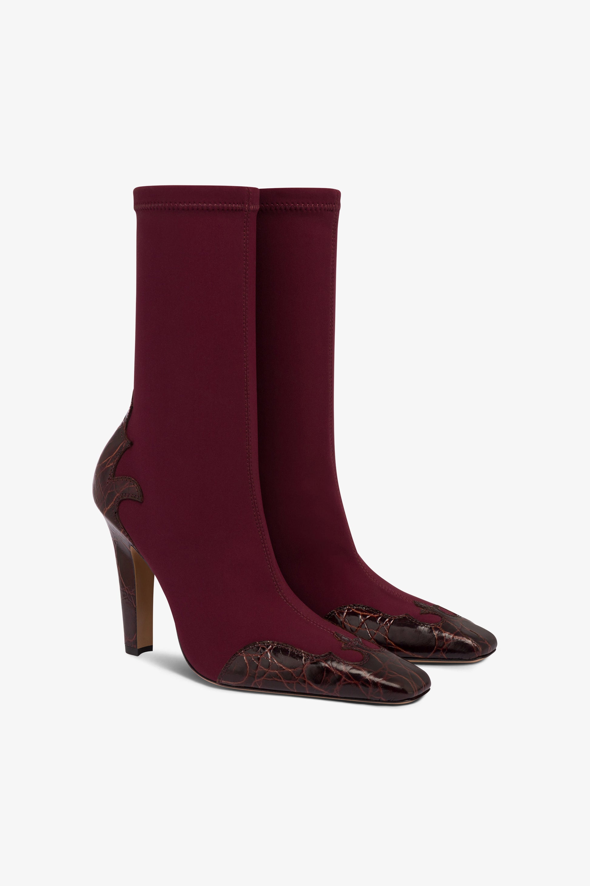 Boots in burgundy croco-embossed and stretchy leather