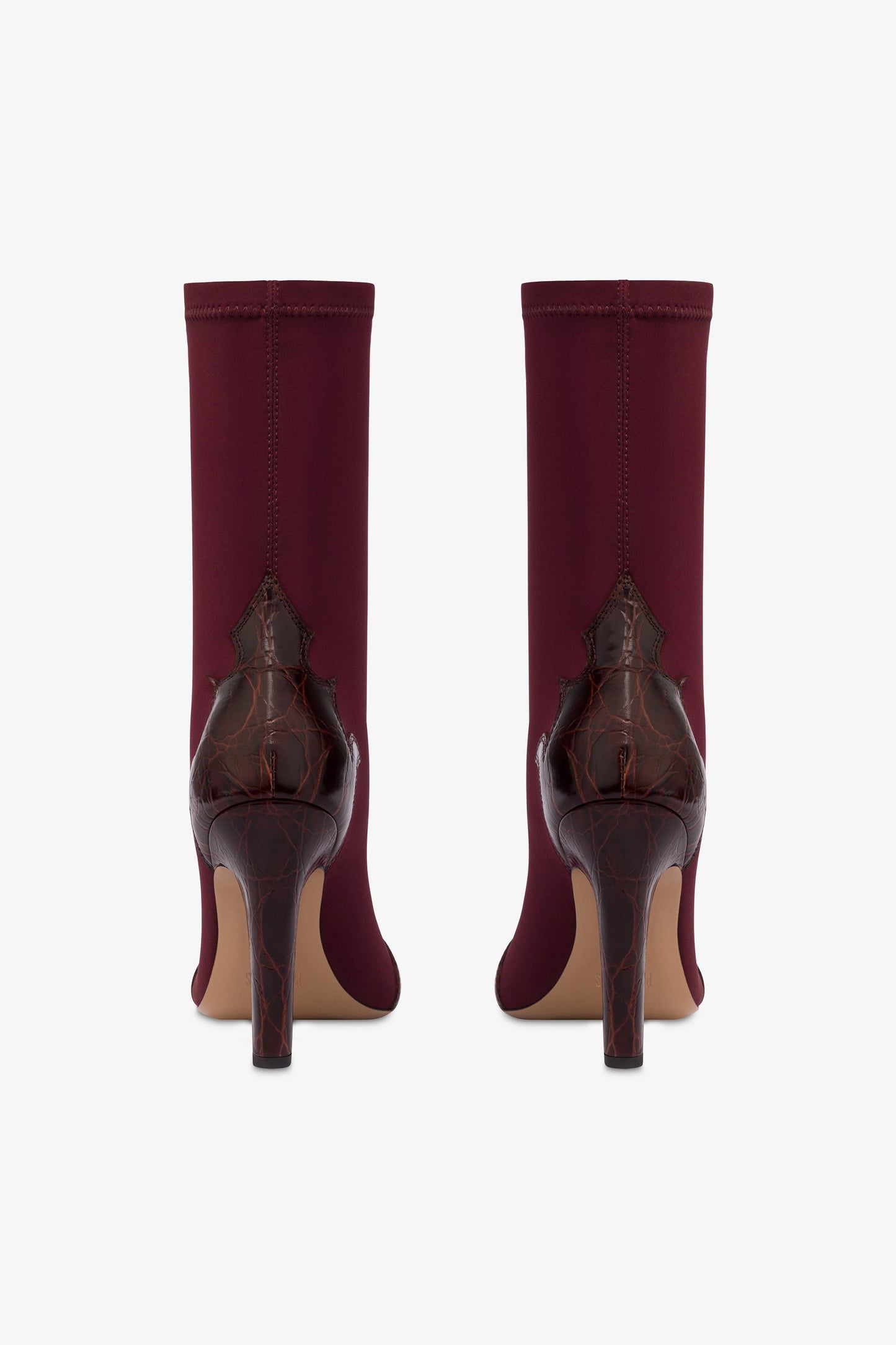 Boots in burgundy croco-embossed and stretchy leather