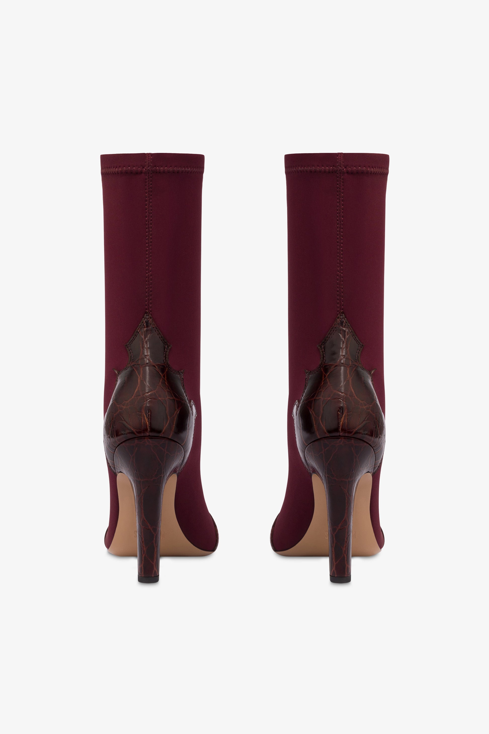 Boots in burgundy croco-embossed and stretchy leather