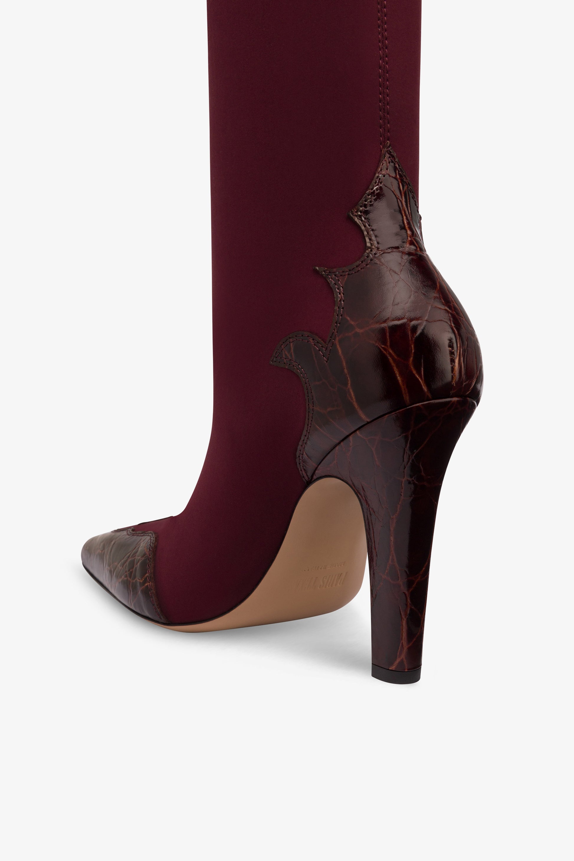 Boots in burgundy croco-embossed and stretchy leather