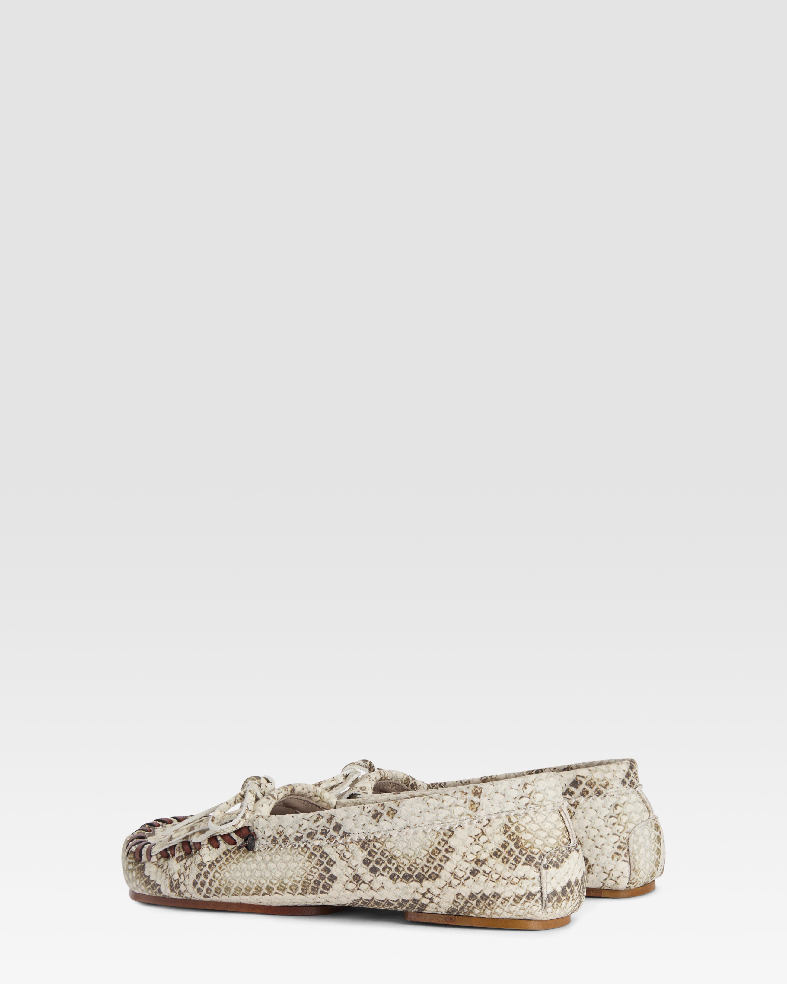 Loafers in natural printed python leather
