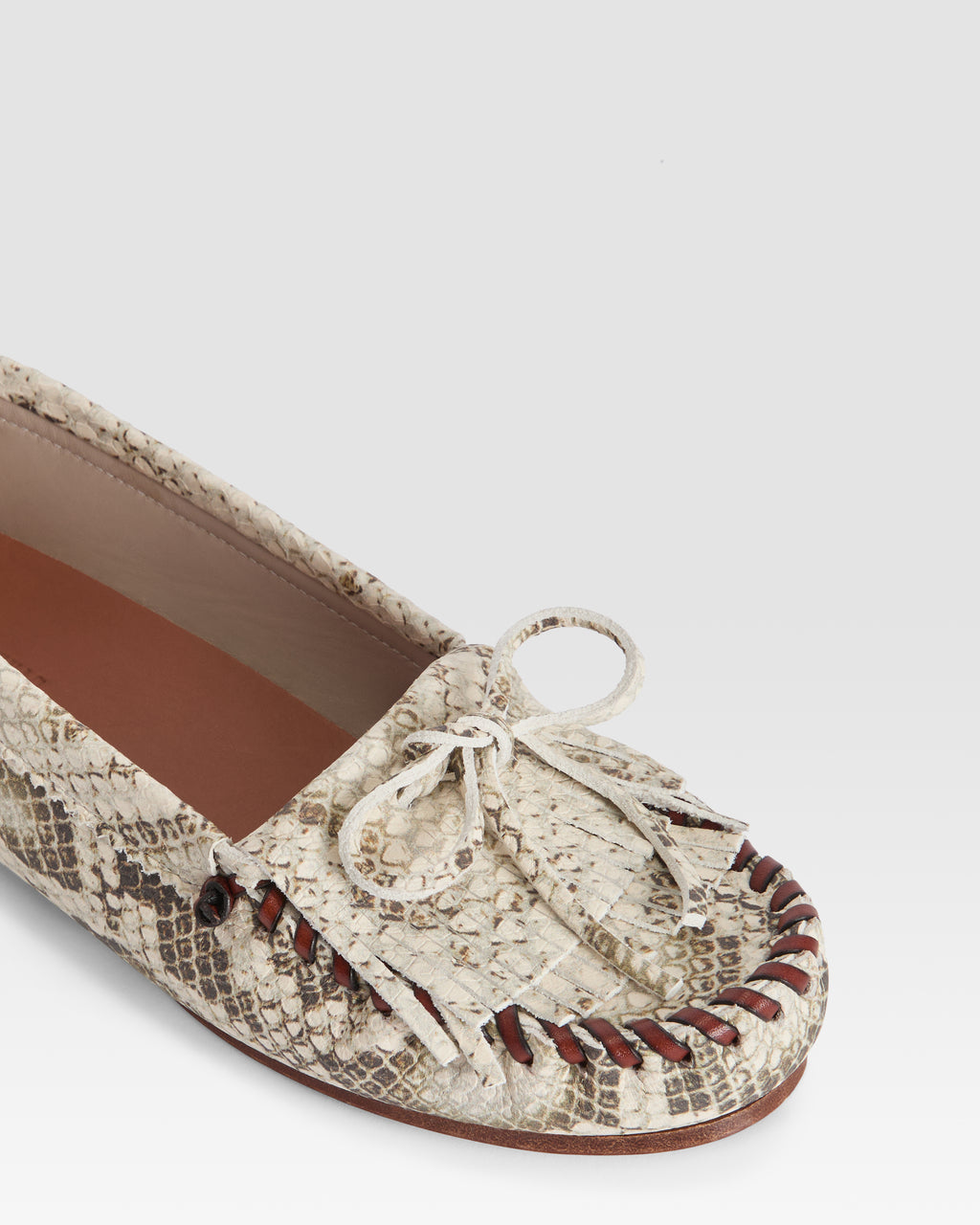 Loafers in natural printed python leather