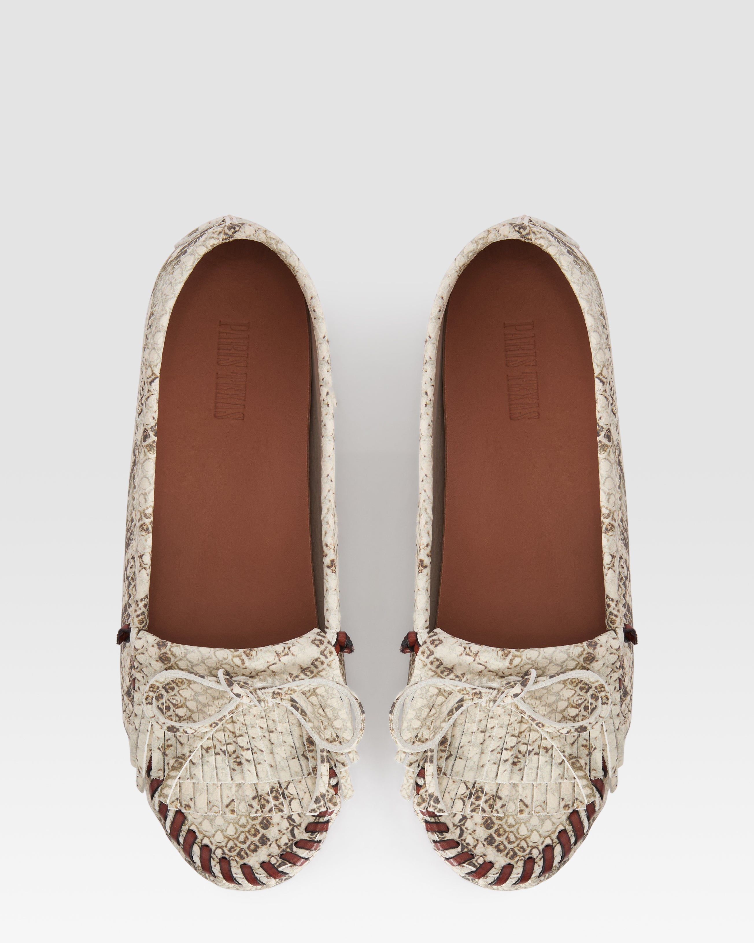 Loafers in natural printed python leather