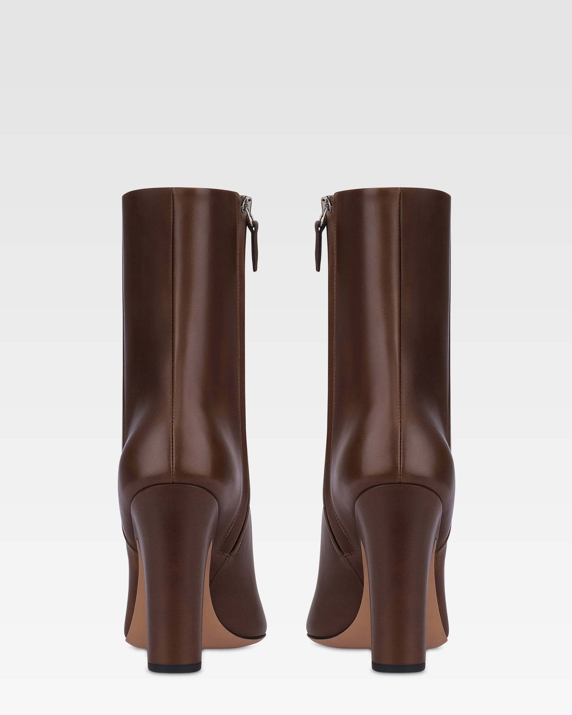 Ankle boots in ebony calf leather