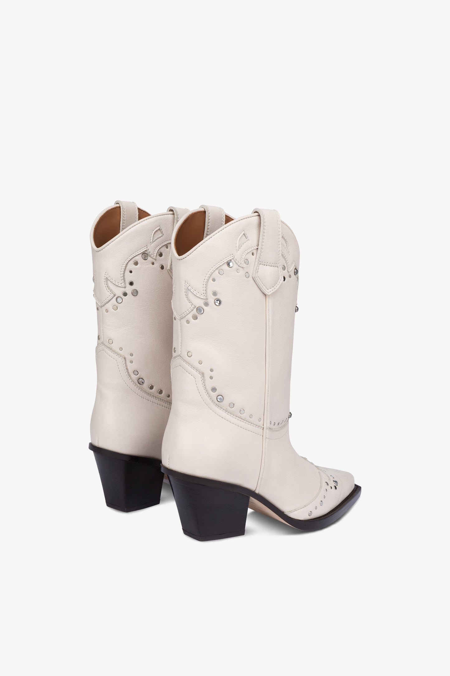 Boots in nickel-studded milk white leather