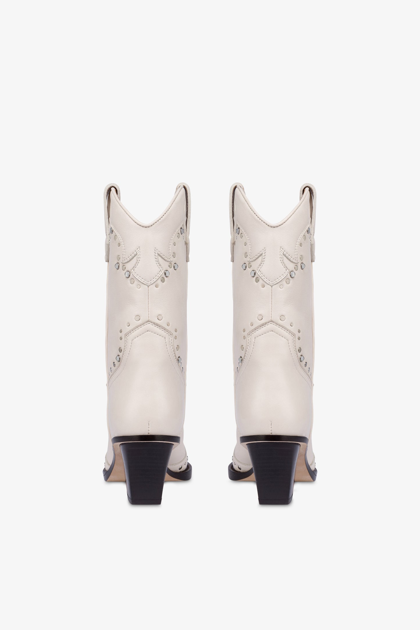 Boots in nickel-studded milk white leather