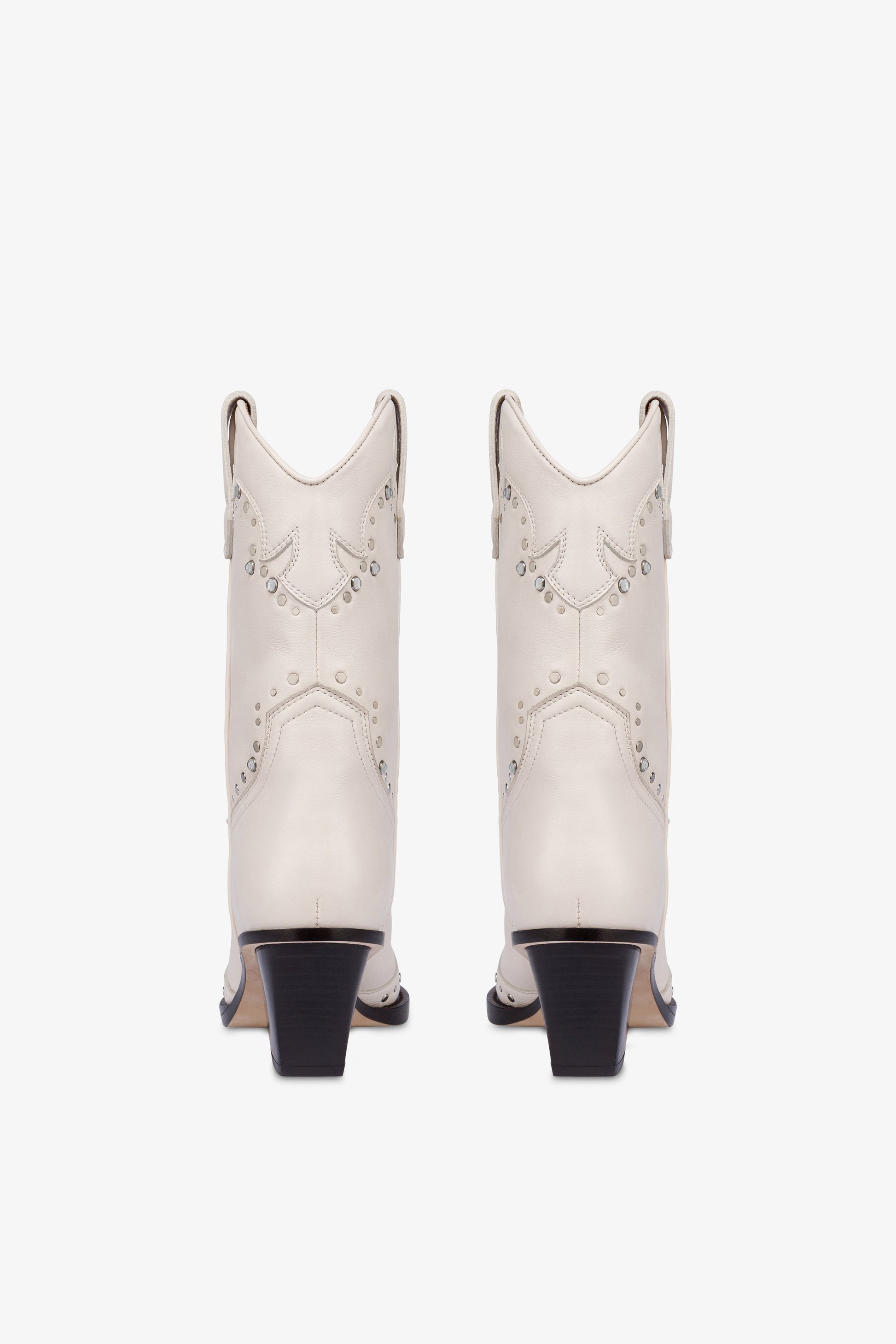 Boots in nickel-studded milk white leather