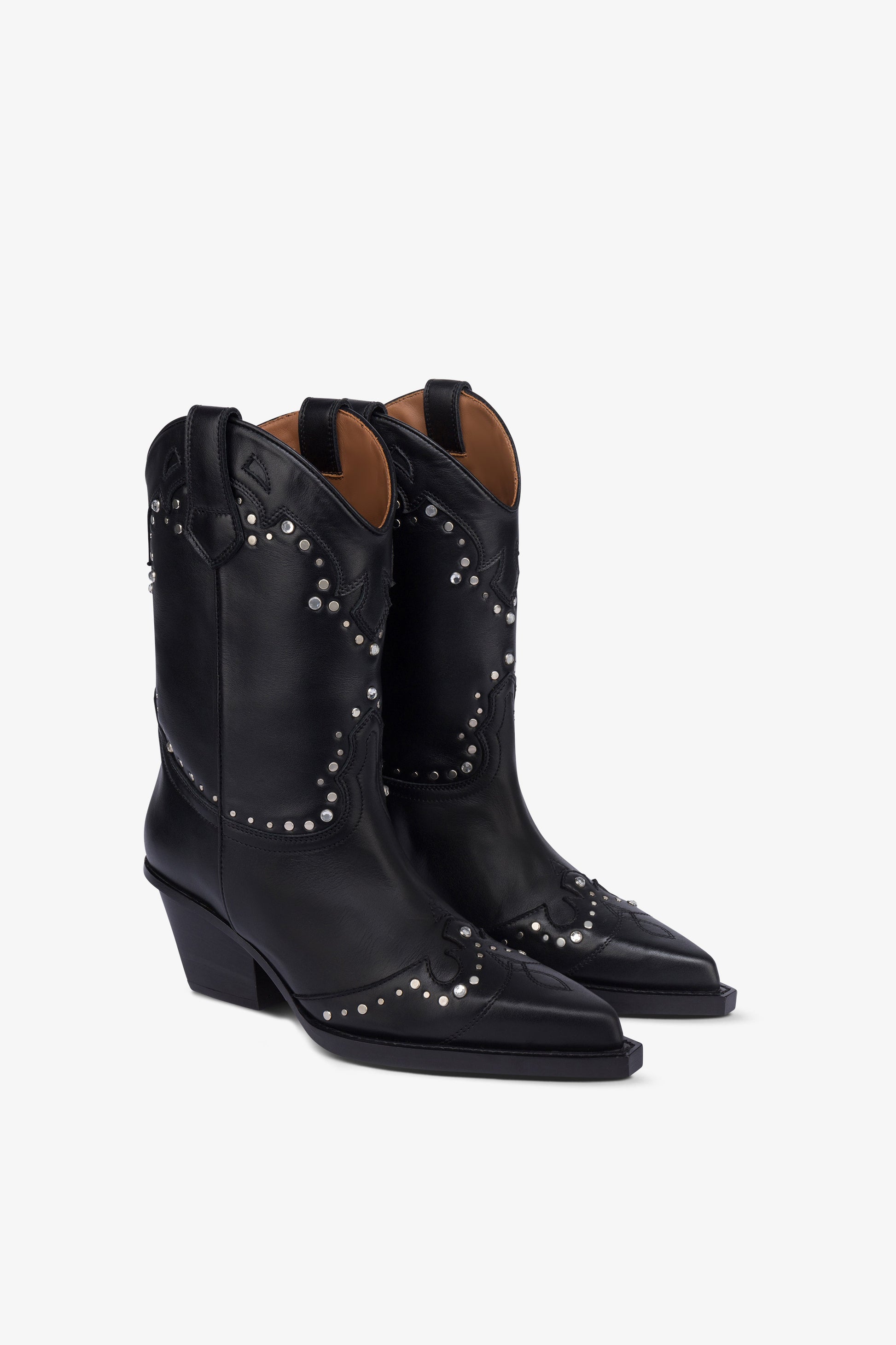 Boots in nickel-studded black leather