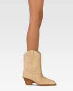 Bottes en cuir suede avec des clous argentes