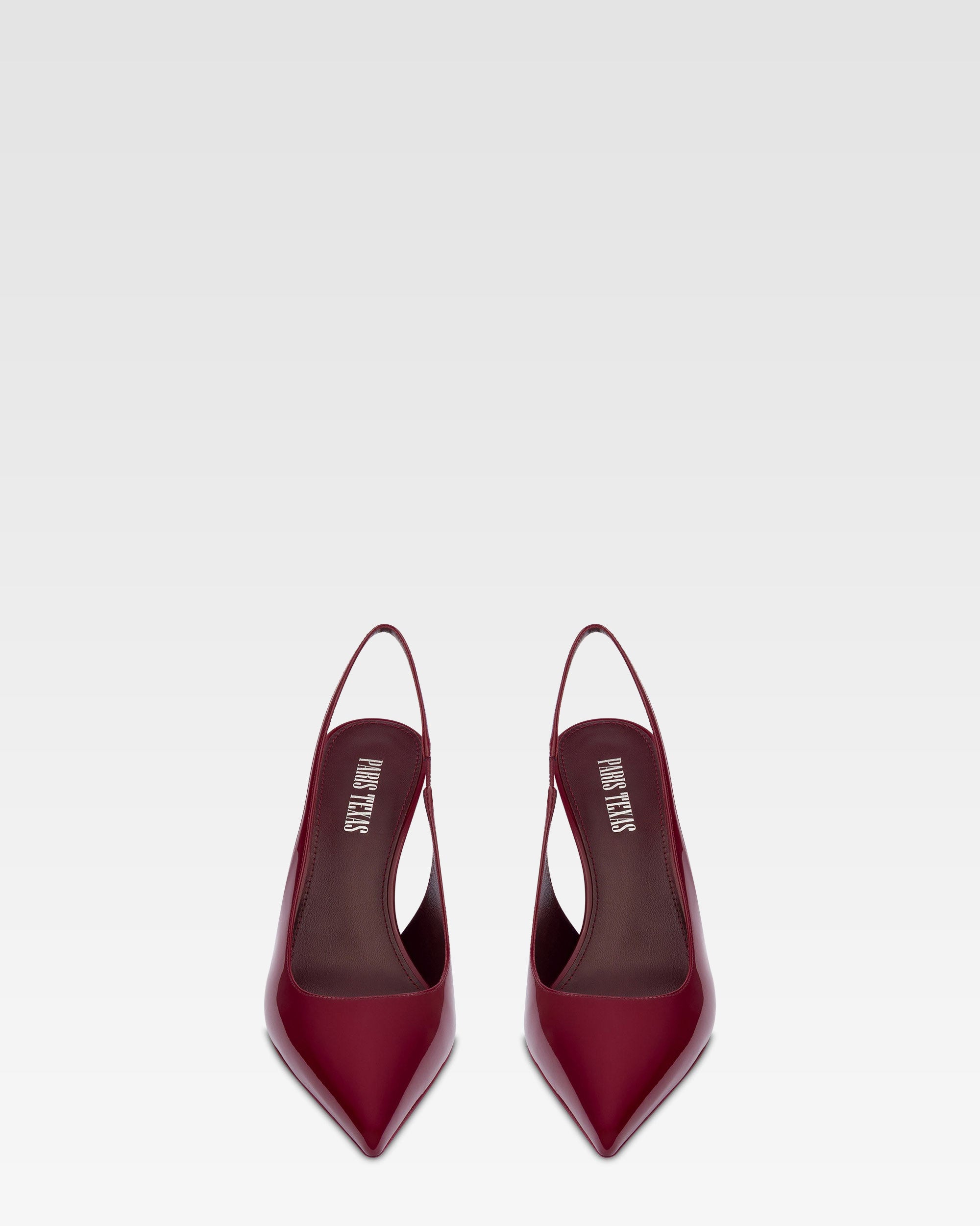 Slingbacks in rouge noir patent leather