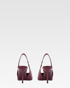 Slingbacks in rouge noir patent leather