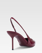 Slingbacks in rouge noir patent leather