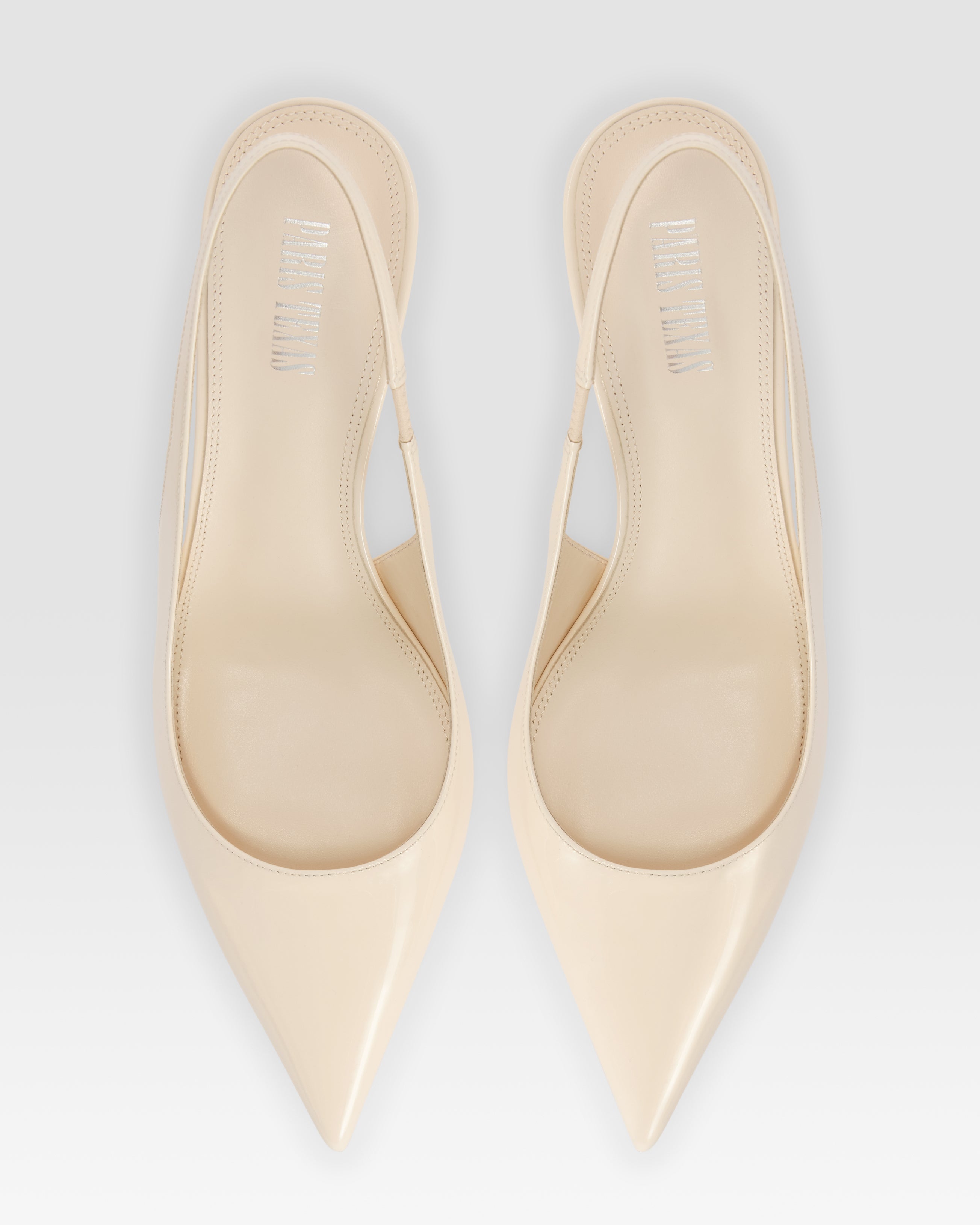 Slingbacks in ivory patent leather