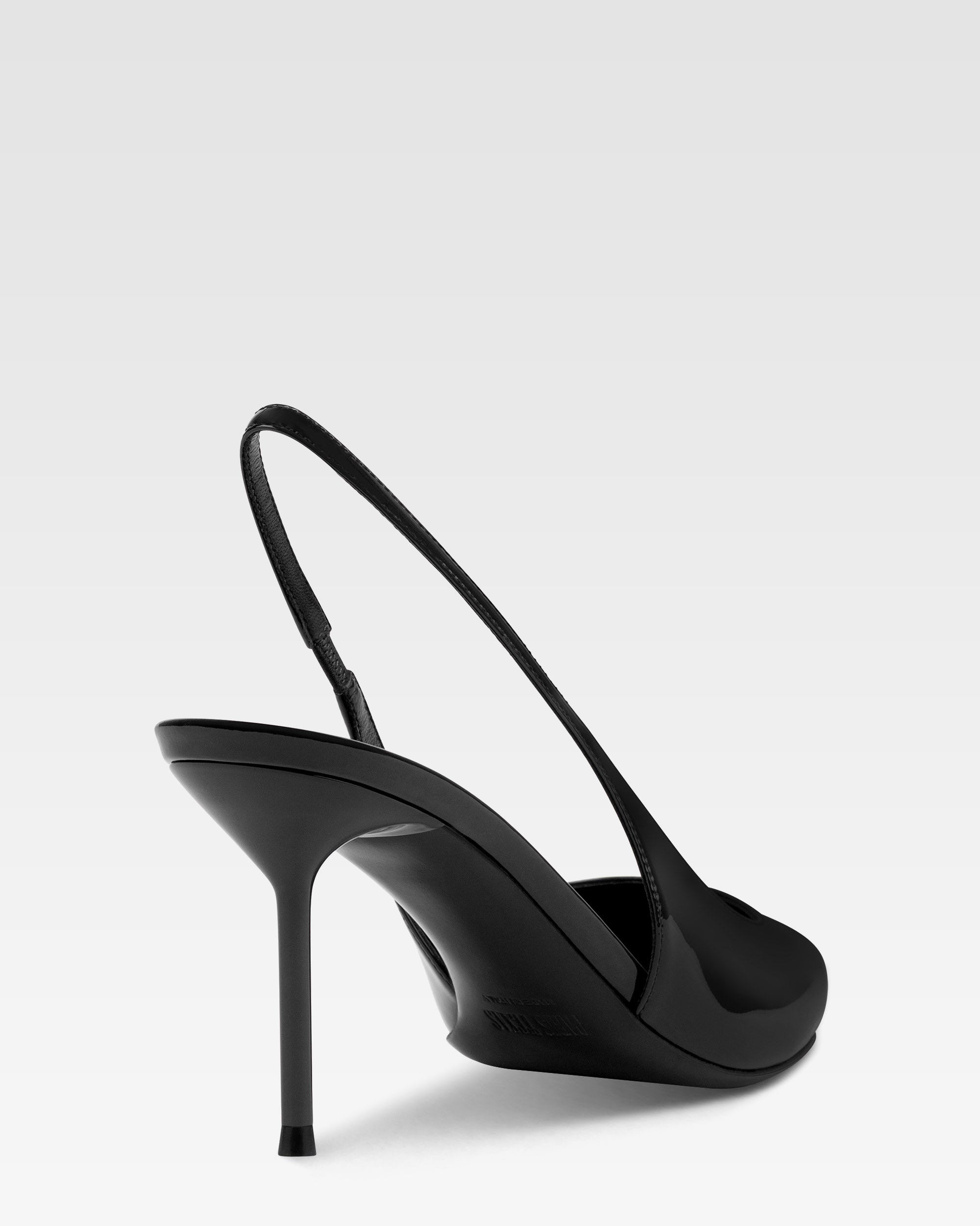 Slingbacks in black patent leather