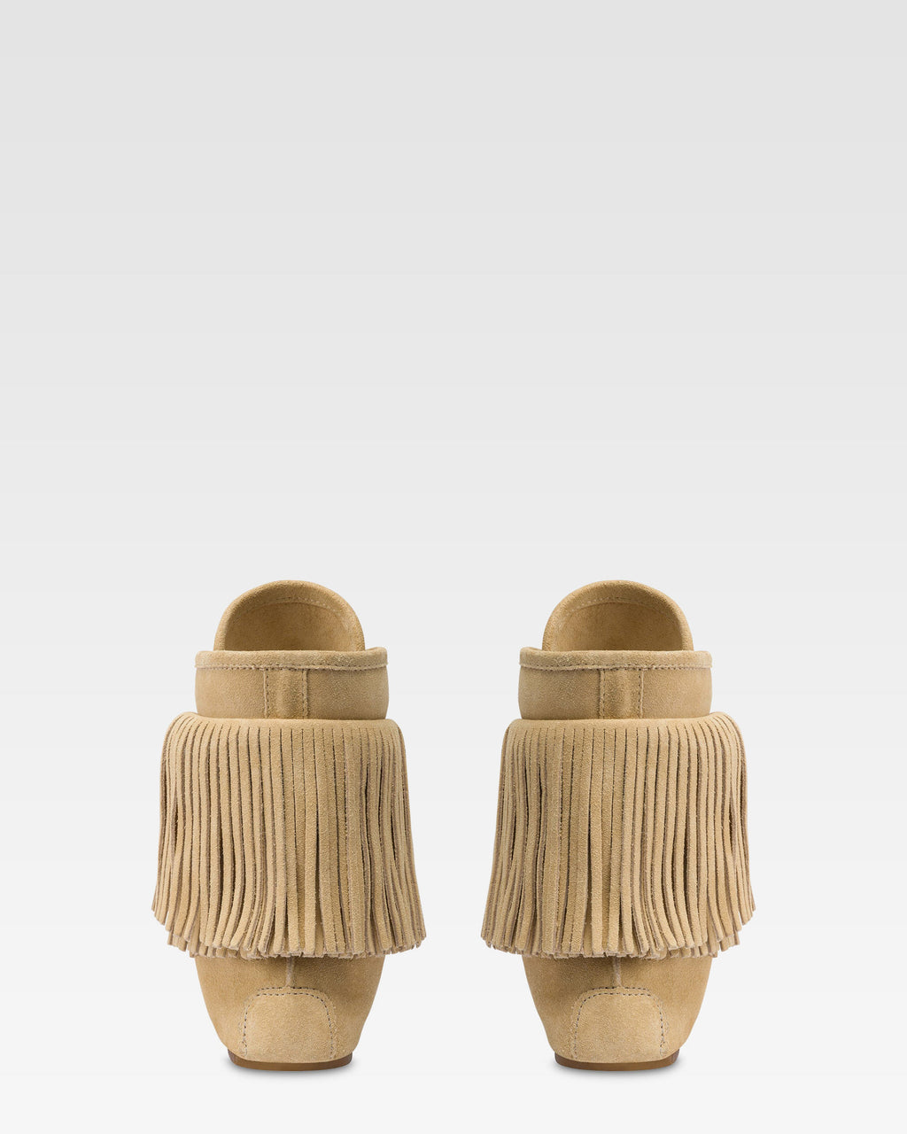 Boots in ecru suede leather