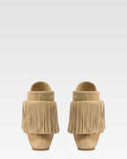 Boots in ecru suede leather