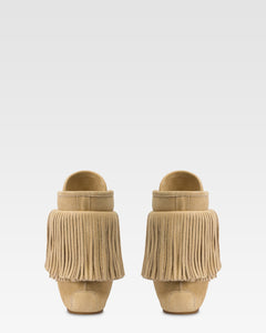 Boots in ecru suede leather