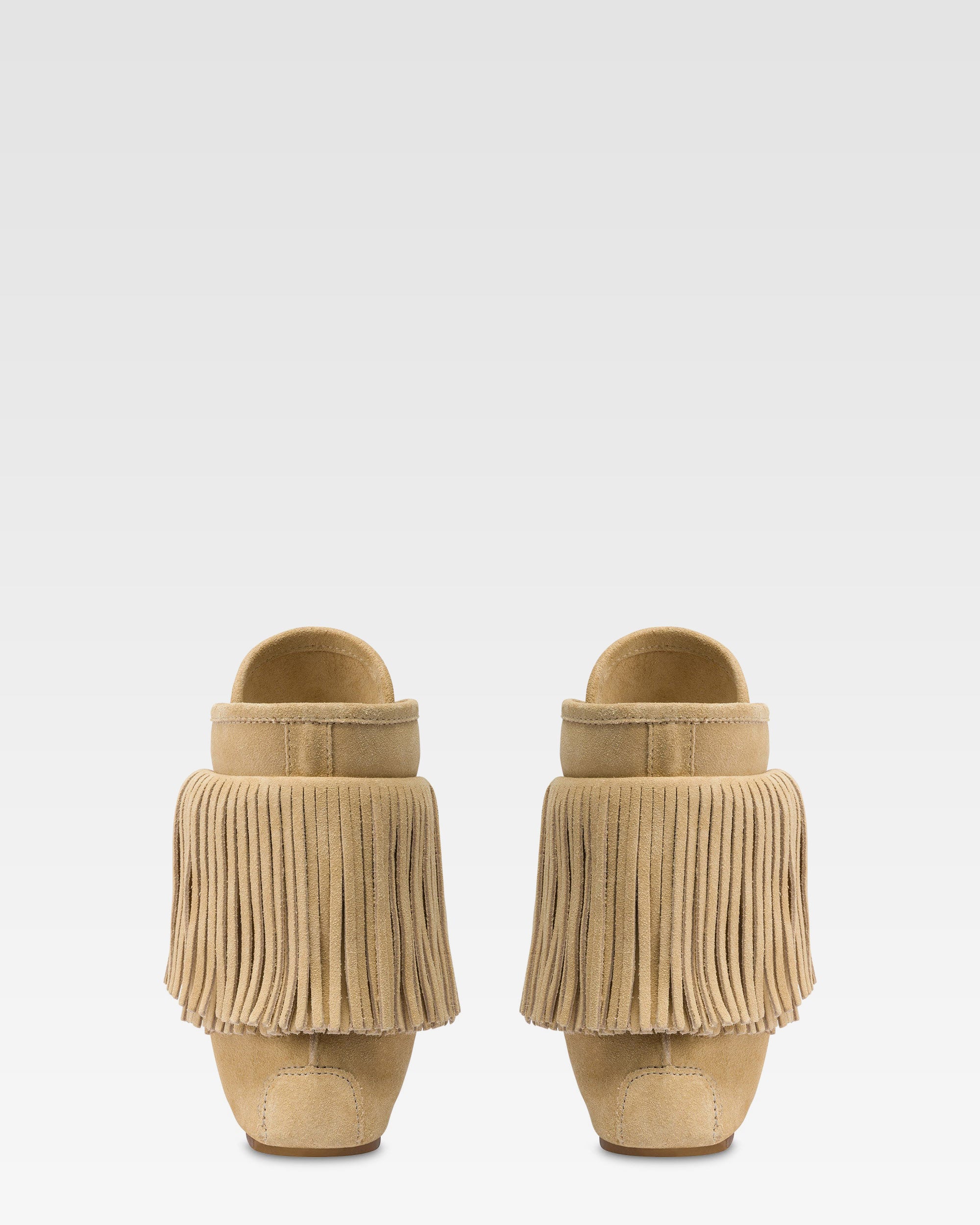 Boots in ecru suede leather