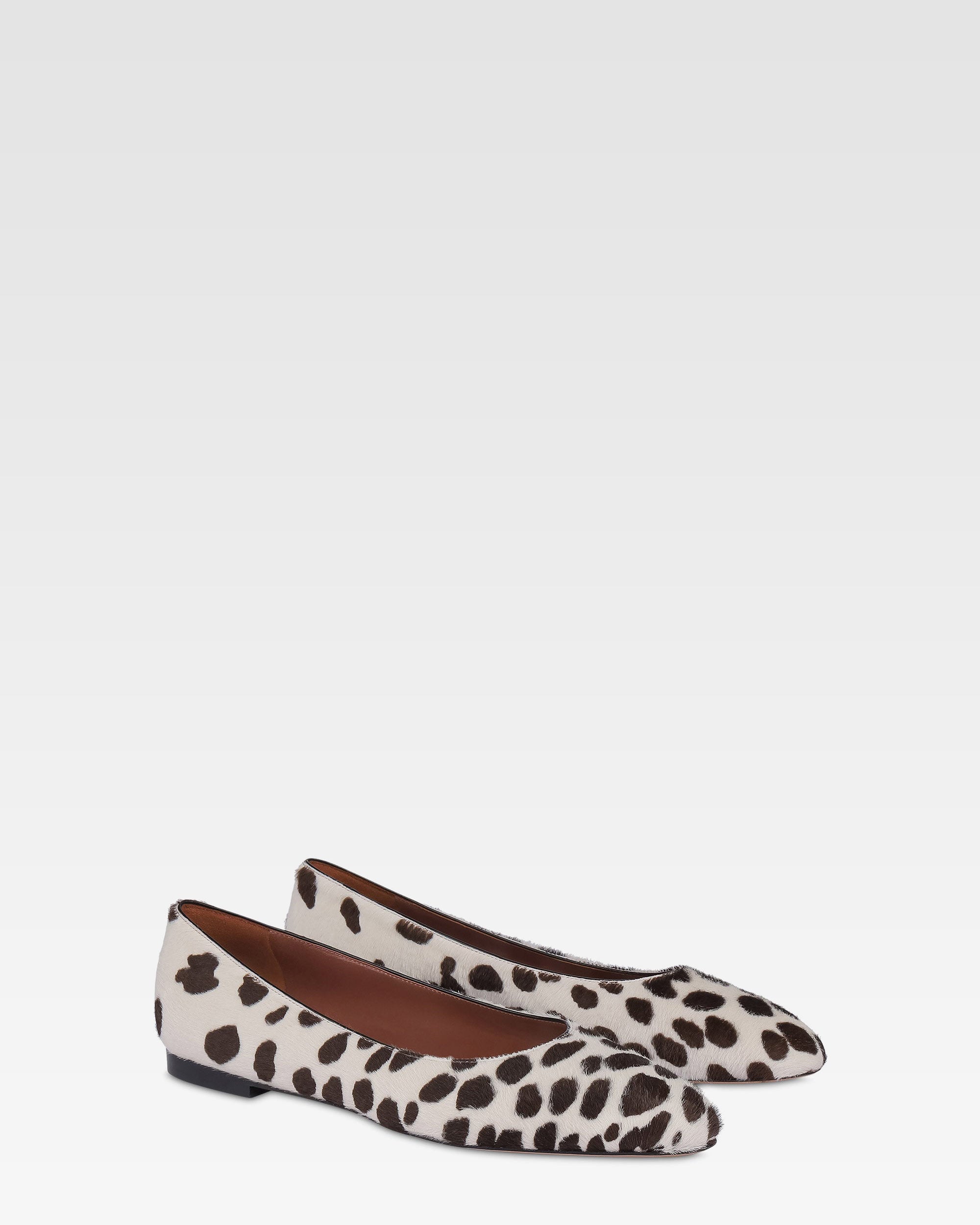 Ballerine in cavallino stampato bianco e marrone scuro