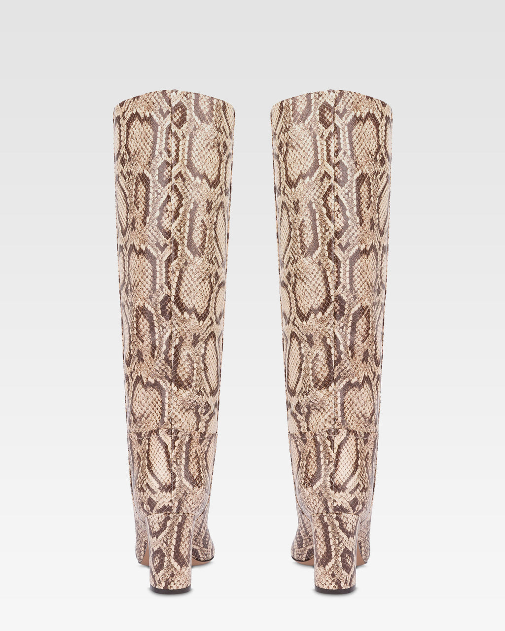 Stiefel aus weissem und dunkelbraunem Leder mit Python-Print