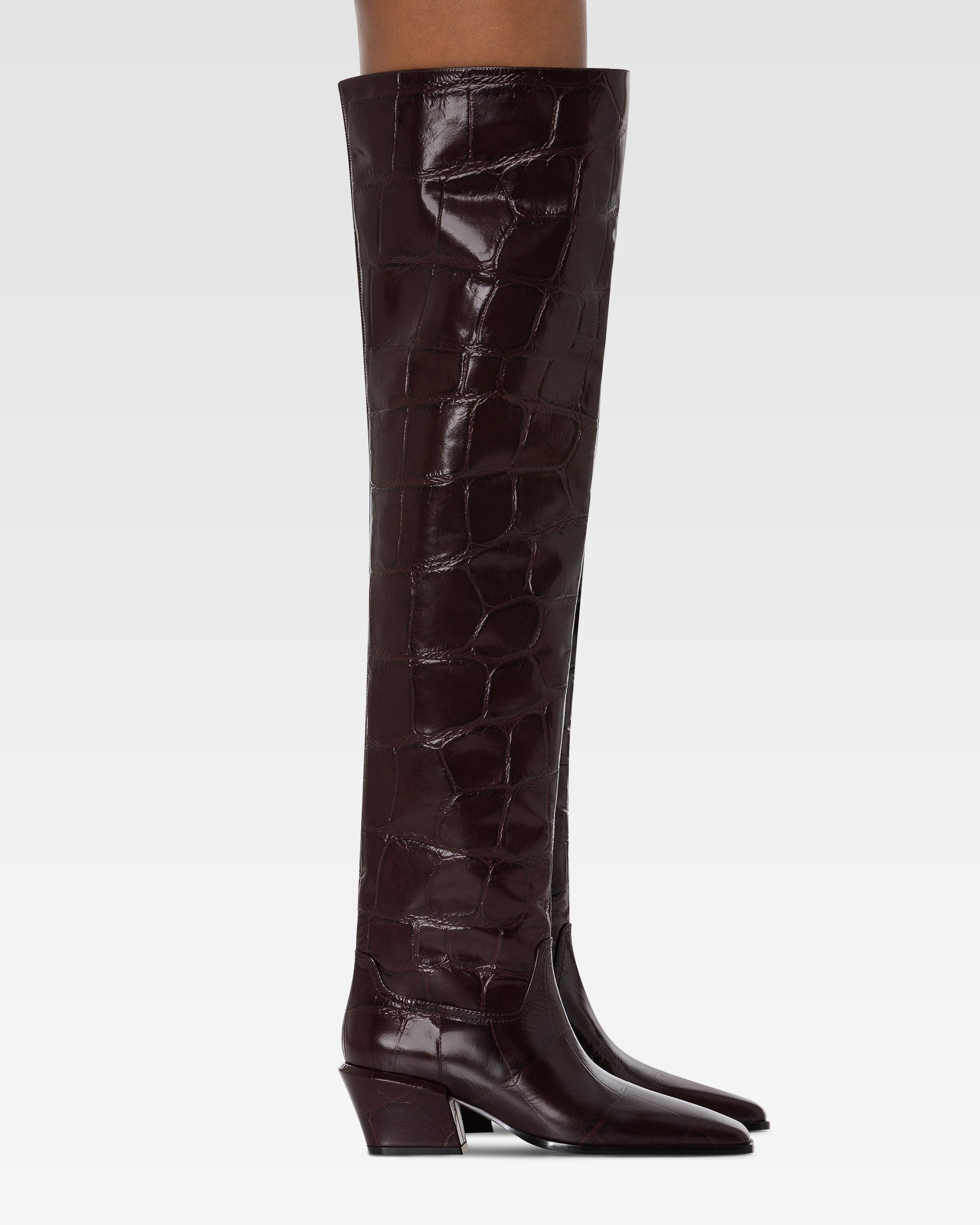 Over-the-knee boots in ebony croco-embossed leather