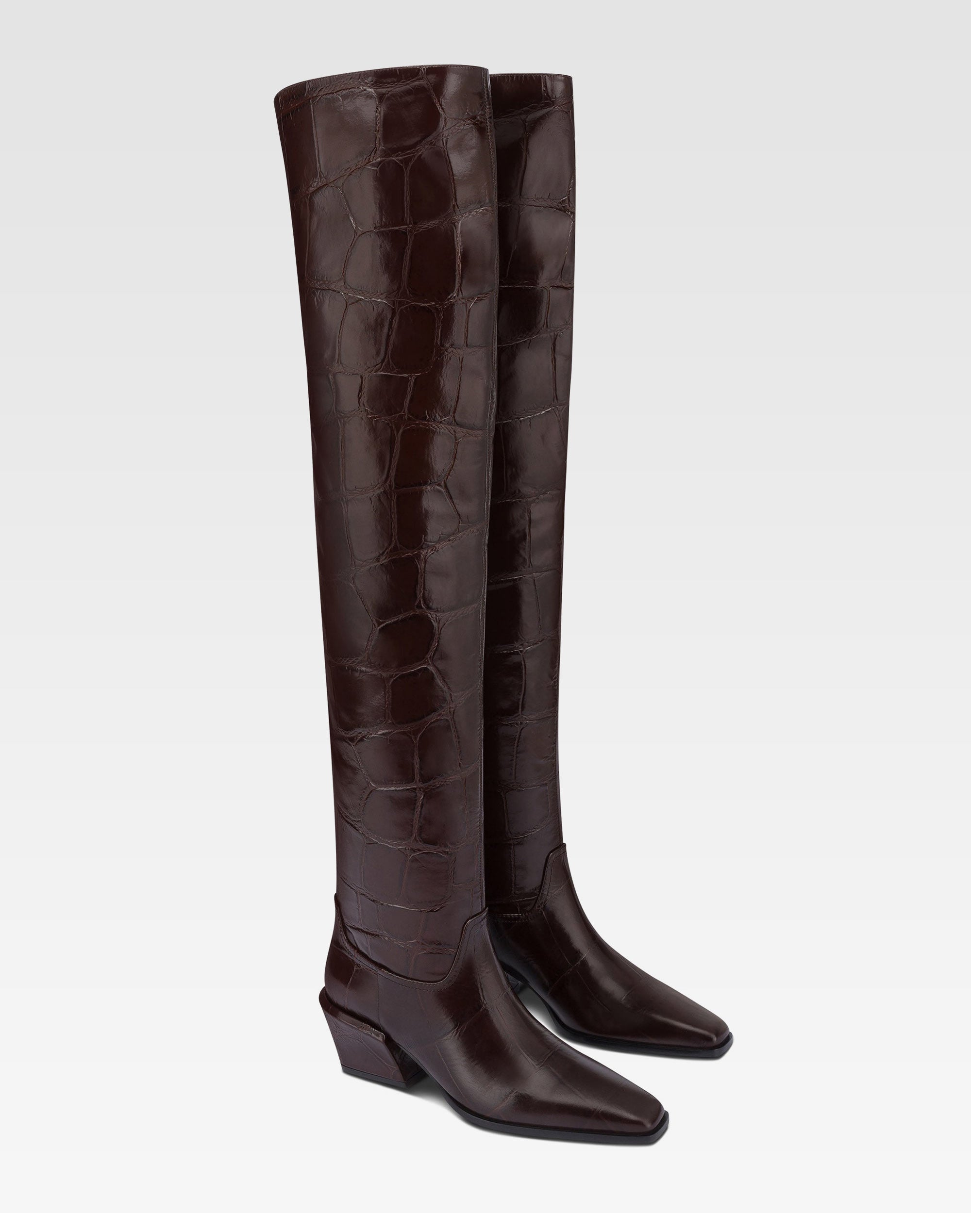 Over-the-knee boots in ebony croco-embossed leather