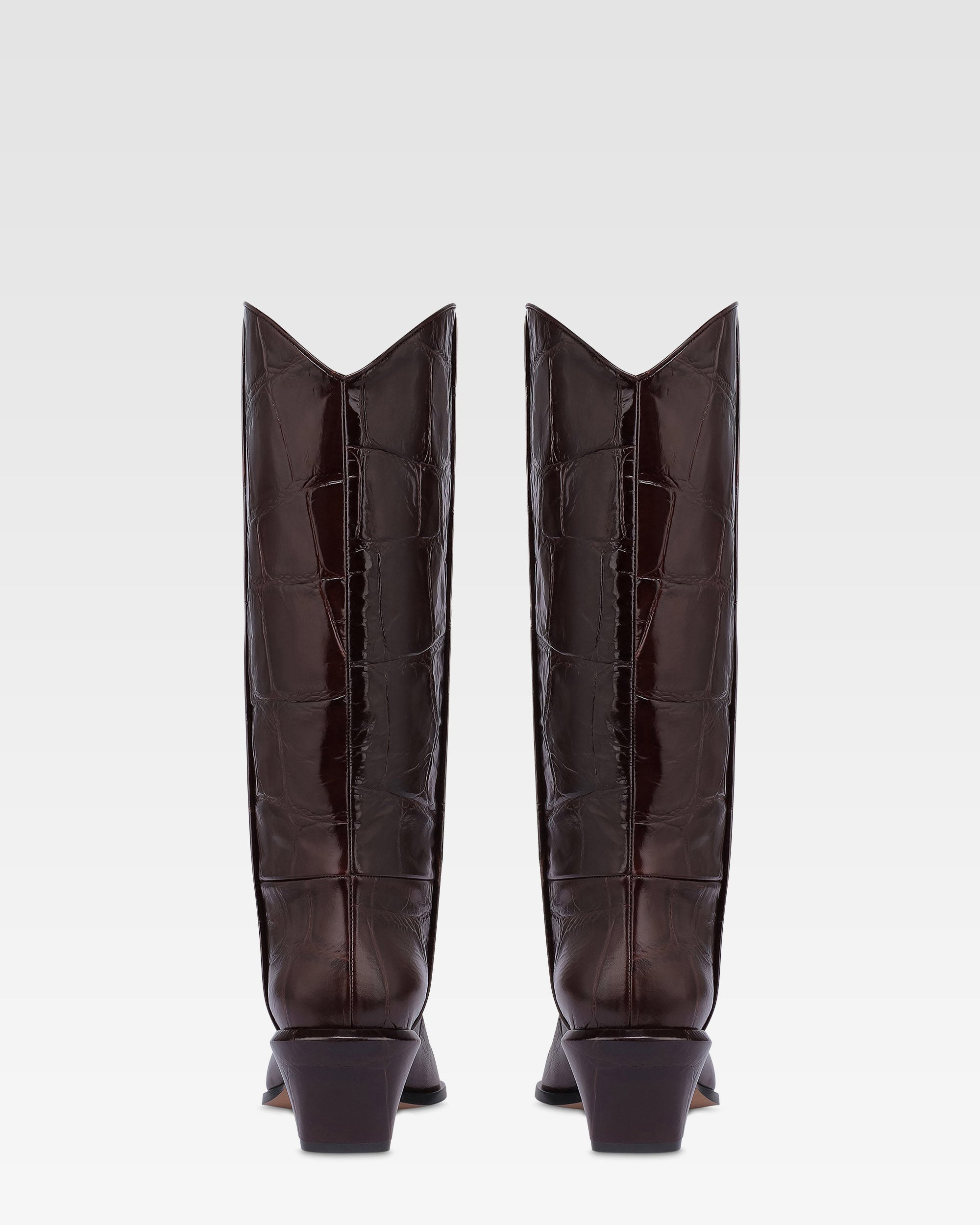 Boots in rouge noir croco-embossed leather