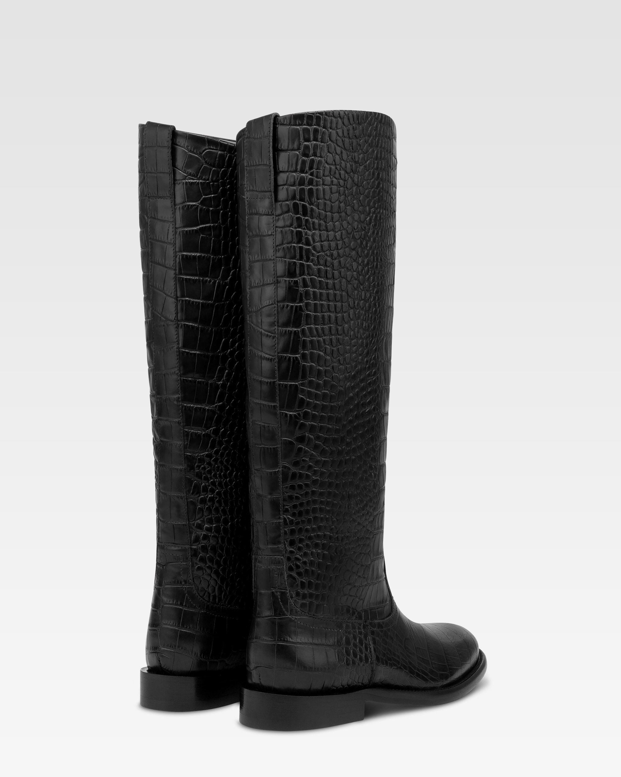 Boots in black croco-embossed leather