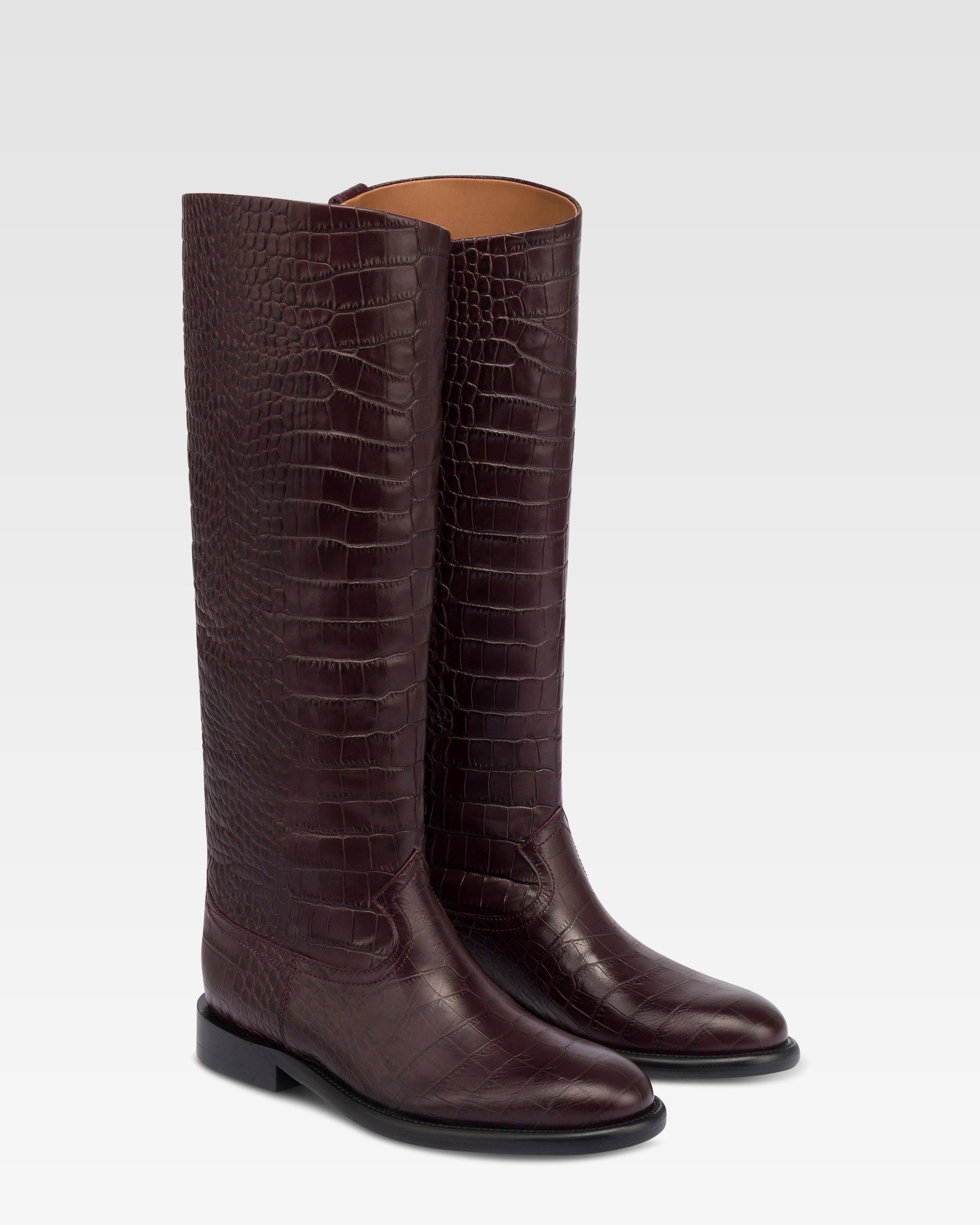 Boots in rouge noir croco-embossed leather