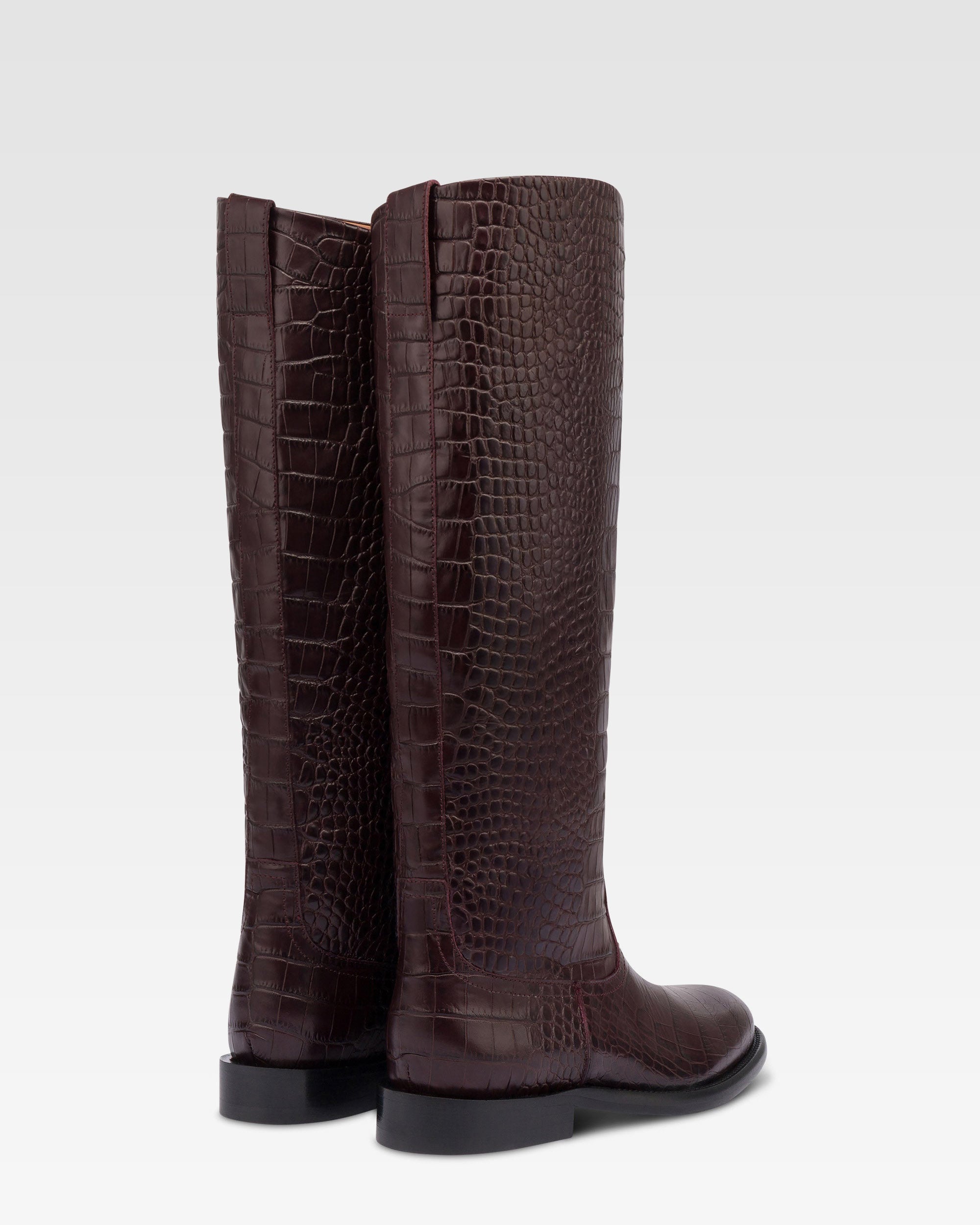 Boots in rouge noir croco-embossed leather