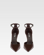 Ankle-strap pumps in ebony patent leather