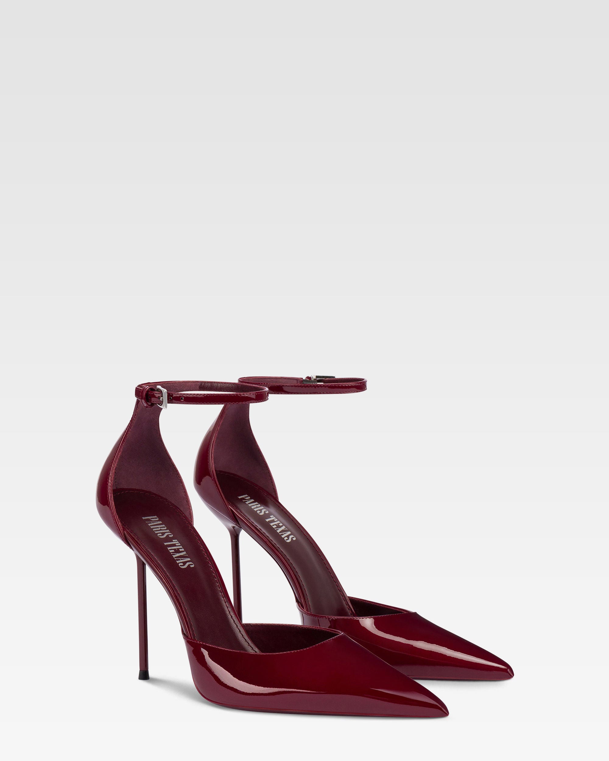 Ankle-strap pumps in rouge noir patent leather