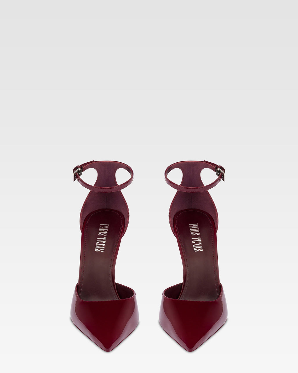 Ankle-strap pumps in rouge noir patent leather