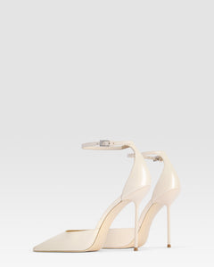 Ankle-strap pumps in ivory patent leather