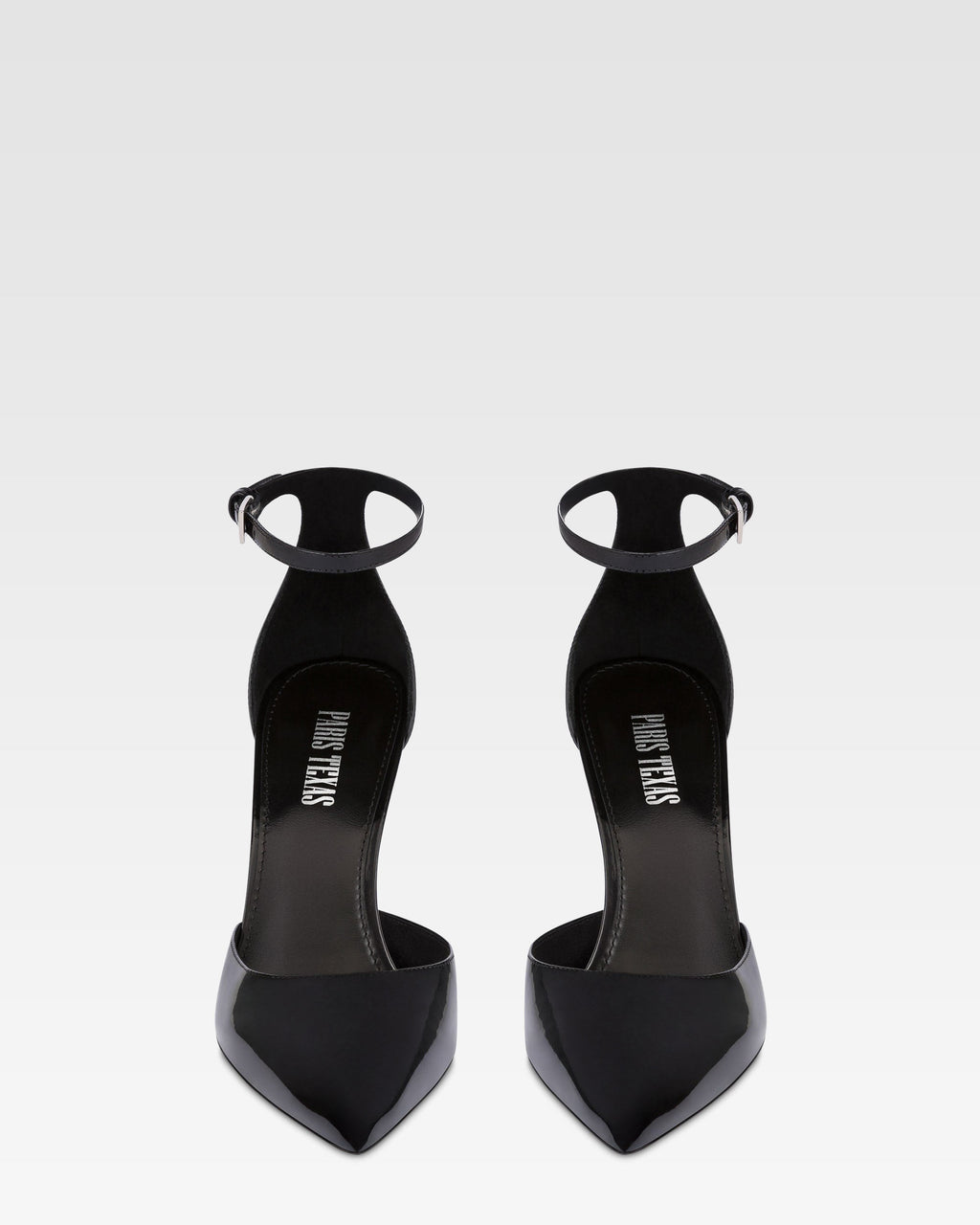 Ankle-strap pumps in black patent leather