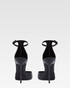 Ankle-strap pumps in black patent leather