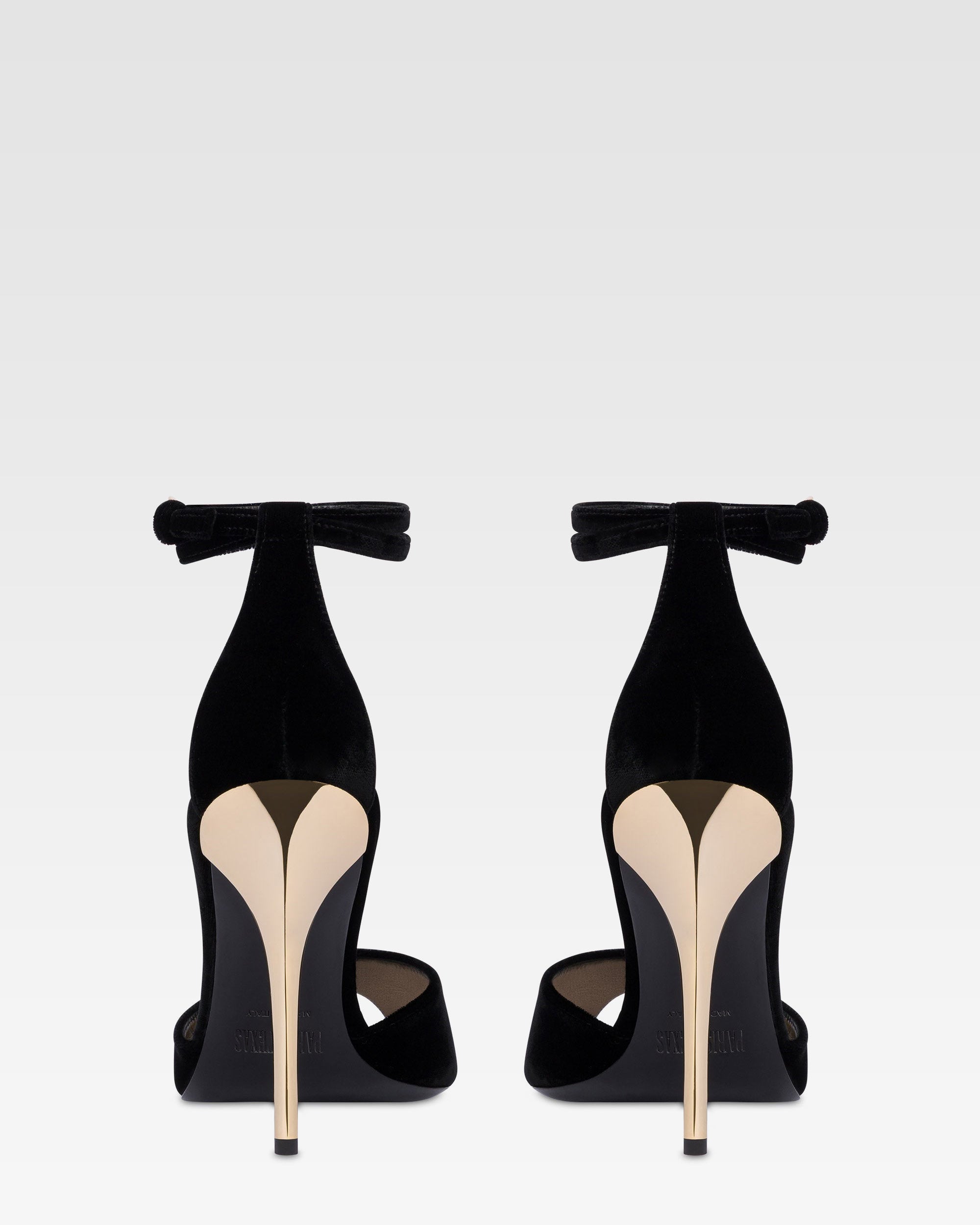 Sandals in black velvet with gold detailing.