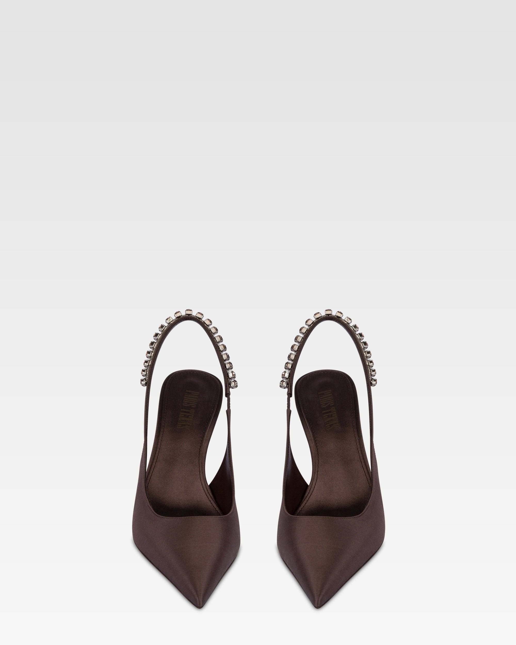 Slingbacks in ebony satin with stud detailing.
