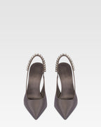 Slingbacks in grey satin with stud detailing.