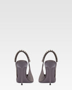 Slingbacks in grey satin with stud detailing.